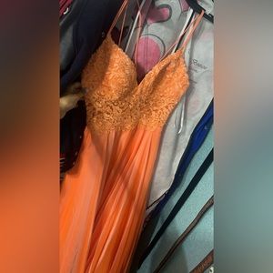 orange prom dress, never worn. size 2
